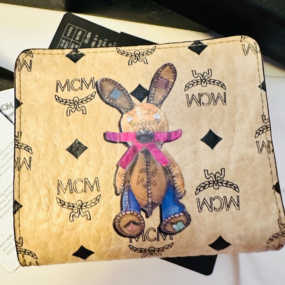 #257 Brand new MCM Tan Wallet with Bunny Motif